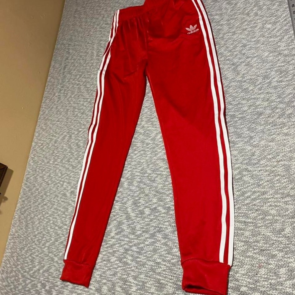 Adidas red with white stripes track pants youth XL  (15-16Y). SKU-A324‎